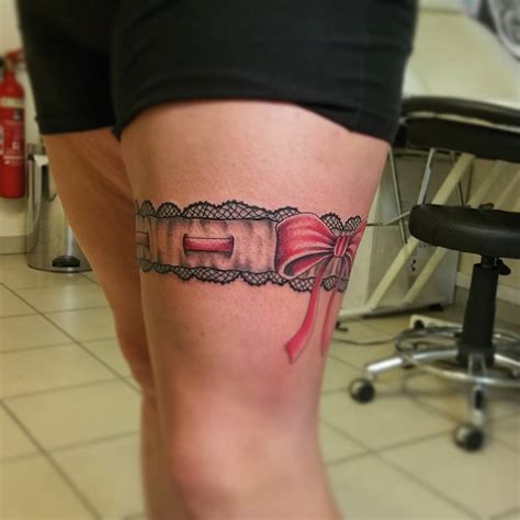 realistic garter tattoo|More.